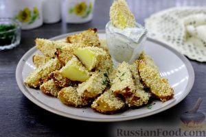 Запечённый молодой картофель в кунжуте, со сметанным соусом